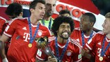 Dante with the FIFA Club World Cup after opening the scoring in Bayern's 2-0 win against Raja