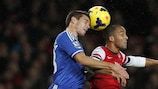 Chelsea's César Azpilicueta challenges Arsenal's Theo Walcott