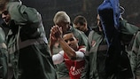 Arsenal forward Theo Walcott is carried off on Saturday