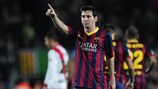 Lionel Messi celebrates after a landmark goal for Barcelona