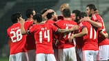 Benfica players celebrate Lima's winner