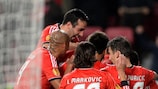 Nicolás Gaitán is mobbed by his Benfica team-mates