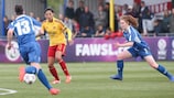 Christen Press takes on Jade Moore (left) and Aiofe Mannion in the first leg