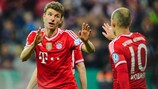 Thomas Müller celebrates after scoring Bayern's third against Kaiserslautern