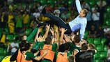 Zimbru players give Oleg Kubarev a lift after their cup success