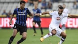 Club Brugge's Fernando pressures Torino's Fabio Quagliarella