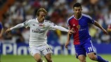 Luka Modrić pursues Behrang Safari during Madrid's 5-1 home win over Basel