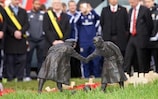 The Wales squad and senior Football Association of Wales officials visited a cemetary in Flanders to remember 1914