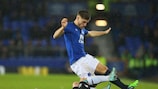 Everton left-back Luke Garbutt attempts to evade the challenge of Krasnodar's Sergei Petrov