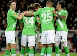 Wolfsburg celebrate their third goal