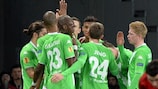 Wolfsburg players celebrate a goal against LOSC