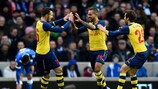Theo Walcott celebrates putting Arsenal ahead at Brighton