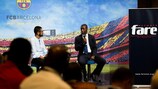 Clarence Seedorf (right) and FARE executive director Piara Powar on stage in Barcelona