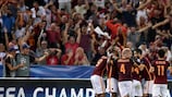 Alessandro Florenzi is engulfed by team-mates after his goal