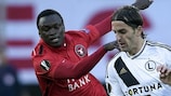 Pione Sisto of Midtjylland pursues Legia's Stojan Vranjes