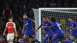 Olympiacos celebrate after forging ahead at Arsenal