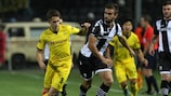 Adnan Januzaj of Dortmund in action with Miguel Vítor of PAOK