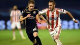 Dinamo's Marko Rog (left) and Olympiacos midfielder Kostas Fortounis on matchday three