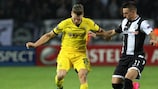 Dortmund full-back Łukasz Piszczek under pressure from PAOK's Róbert Mak