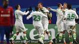 André Schürrle (second right) is mobbed after scoring Wolfsburg's second