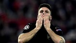 Olivier Giroud's hat-trick took Arsenal through at the expense of Olympiacos
