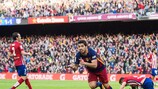 Luis Suárez celebrates after scoring the winner against Atlético