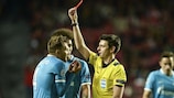 Domenico Criscito is shown a red card during the first leg