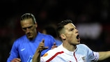 Kevin Gameiro celebrates after making it 3-0 to Sevilla in the first leg