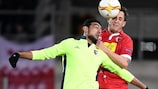 Braga's Ahmed Hassan feels the presence of Sion defender Reto Ziegler
