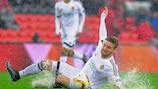 Valencia's Shkodran Mustafi splashes to ground in the first leg