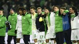 Wolfsburg players celebrate victory against Gent