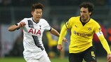 Spurs' Son Heung-Min takes on Dortmund's Mats Hummels