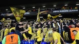 Dortmund players celebrate quarter-final qualification with their supporters at White Hart Lane