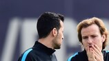 Sergio Busquets and Ivan Rakitić training with Barcelona on Monday