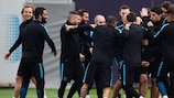 Barcelona players enjoy a lighter moment at training on Monday