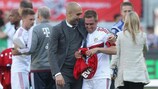 Josep Guardiola celebrates Bayern's title success with captain Philipp Lahm