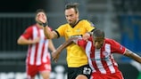 Young Boys's Scott Sutter challenges Sebá of Olympiacos