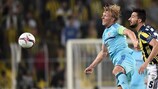 Dirk Kuyt and Mehmet Topal vie for possession when the teams met on matchday two