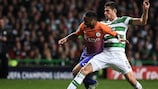 Raheem Sterling tussles with Nir Bitton during the sides' 3-3 draw at Celtic Park