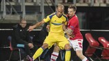 Maccabi Tel-Aviv defender Tal Ben Haim holds off AZ's Mattias Johansson