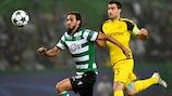Bryan Ruiz and Sokratis Papastathopoulos vie for the ball during the clubs' Lisbon encounter