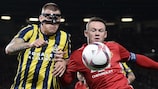 Martin Škrtel takes on Wayne Rooney at Old Trafford