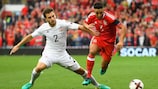 Otar Kakabadze of Georgia in action with Neil Taylor (right) of Wales during their 2018 FIFA World Cup qualifier
