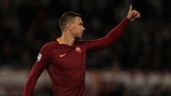 Roma maintain pursuit, Rooney makes history