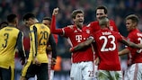 Thomas Müller is mobbed after scoring Bayern's fifth