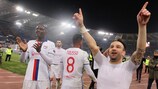 Lyon celebrate reaching the quarter-finals