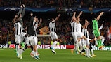 Juventus players celebrate knocking out Barcelona
