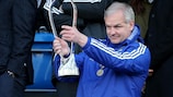 Chelsea FC development manager Adi Viveash raises the UEFA Youth League trophy