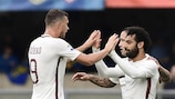 Mohamed Salah and Edin Džeko celebrate a goal for Roma last May