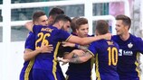 Maribor celebrate a goal en route to qualifying for the group stage